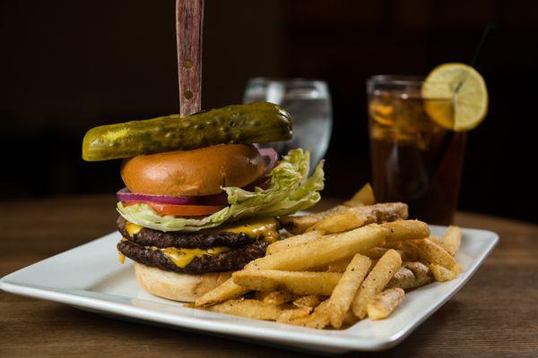 All American burger: Served the old fashion way, two ground beef patties topped with pickle, onion, lettuce, and tomato.  & choice of cheese