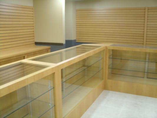 Custom built laminate display case.  All American Cabinetry, Inc.  Ocala, FL