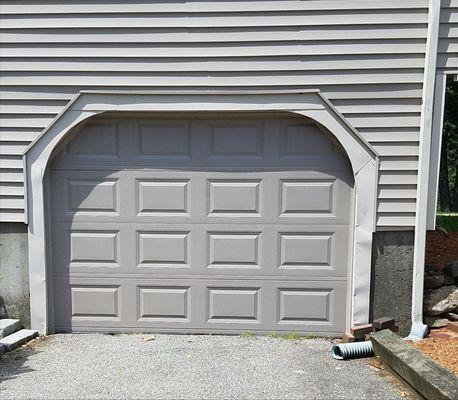 Exterior view. Yes, the surround trim needs to be replaced, but Countryside did great job on the door.