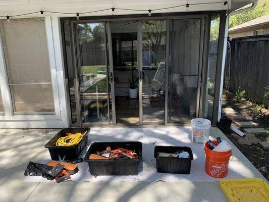 Setting up for a custom sliding glass door installation.