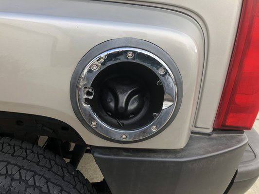 Broken gas cap by dealer