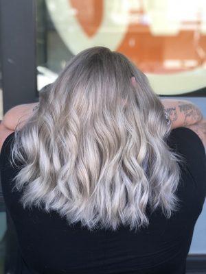 platinum blonde with a root smudge