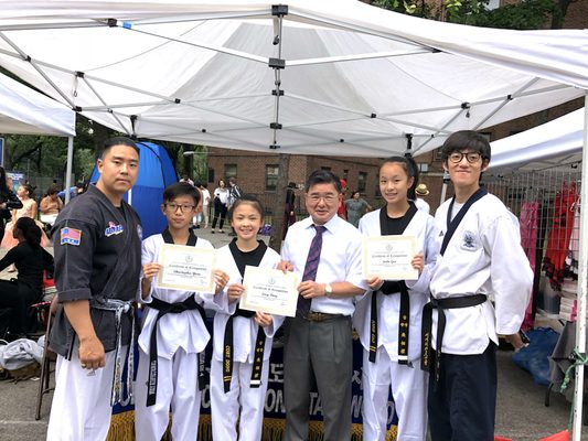 Our AAU National team members receiving a certificate of recognition from the council member Peter Koo!