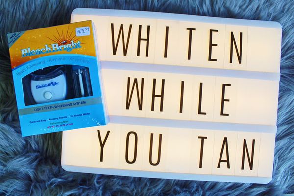 Achieve a whiter smile while tanning! It also comes with a portable light to use at home