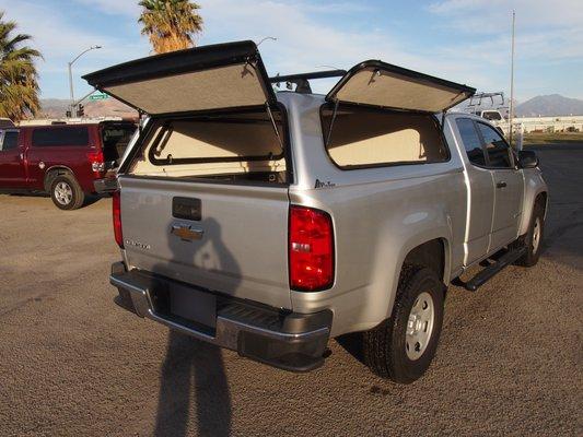 ProTops Model 500 Commercial Cab High Camper Shell with Optional Solid Side and Rear Doors and Rhino Aero Vortex Roof Rack