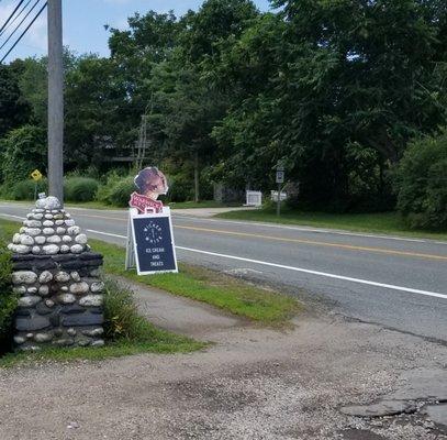 Located off the road: look for this sandwich board advertising Warwick Ice Cream!