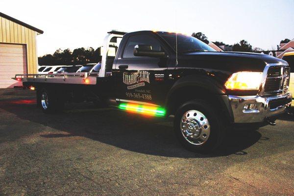 Custom lighting package on a tow truck for Lizard Lick Towing