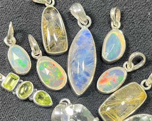 Sterling Silver & Gemstone Pendants
Opal, Rainbow Moonstone, Rutilated Quartz, Peridot, & many more