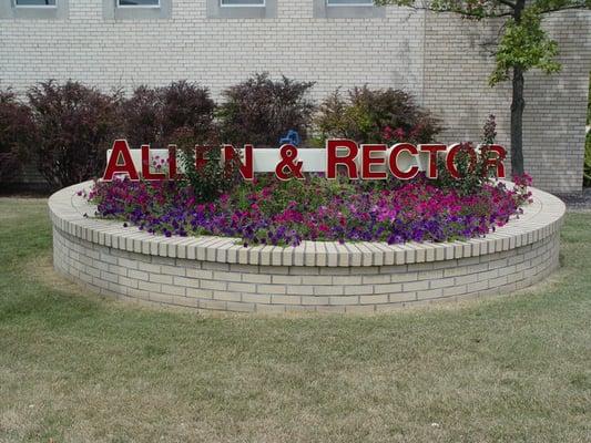 Planter and sign in front of the Lebanon office.