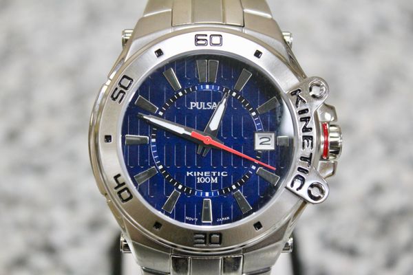 Pulsar Par 145 Kintetic Stainless-Steel with stainless steel case blue dial, transaparent case back watch.