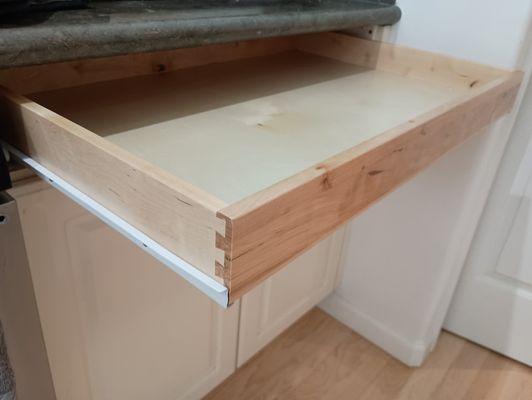 Oversized kitchen drawer falling apart? We can replace with a new drawer box, drawer slides, and reuse the original drawer front.