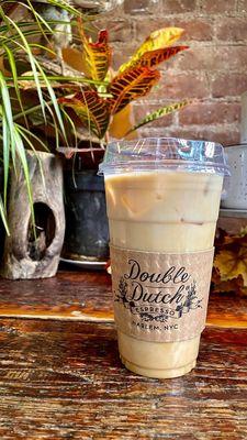 Vanilla iced coffee on store front counter