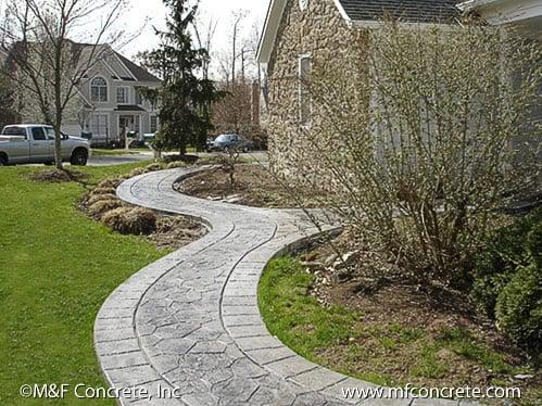 Stamped Concrete walkway by M & F Concrete.