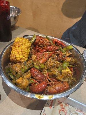 Mixed sauce crawfish with mushrooms, corn, edamame