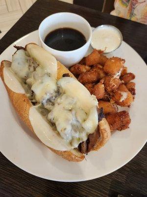 Shaved Prime Rib French Dip with side of Cheese Curds