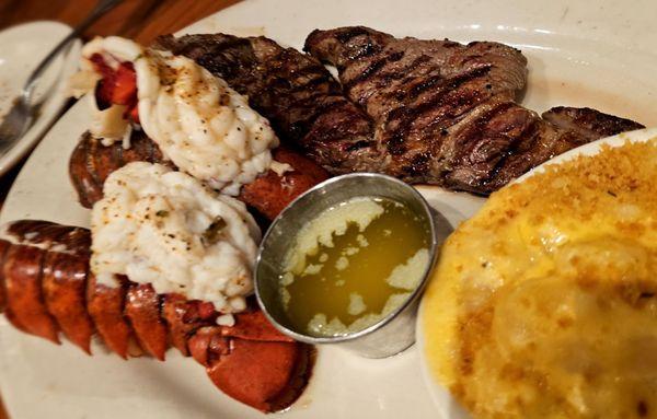 Rib eye and lobster.