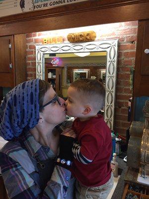 I never say no to a kiss from my grandson... he loves his cool haircut!!