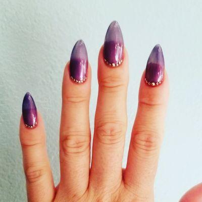 Purple Jelly nails with rhinestones.