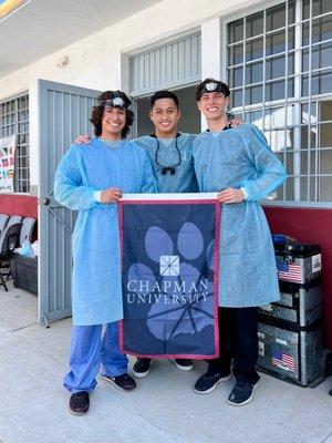 Dr Rosales volunteering doing pediatric dentistry with two Chapman University pre-dental students near Ensenada, Mexico.