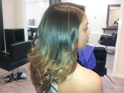 All services are rendered in a beautiful professional salon. Press and Curl With Ombre' Color