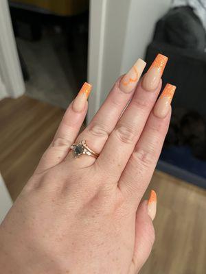 The orange glitter french tip full set