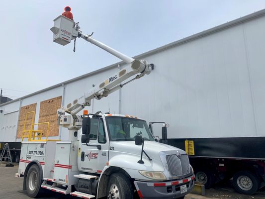 HiWire Bucket Trucks preparing a load