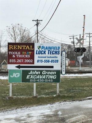 Sign at our driveway on Naperville Rd.  We are located inside of Plainfield General Rental.