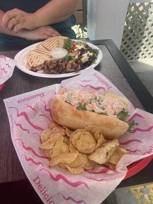 Lobster roll and chicken kebab.