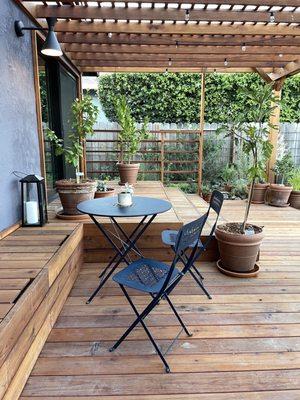 Redwood patio deck with steps and bench storage