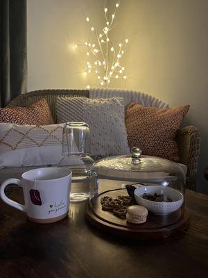 Treats, hot tea, cozy seating.