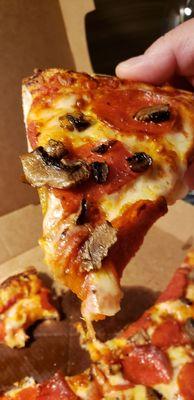 Pepperoni and mushroom pizza