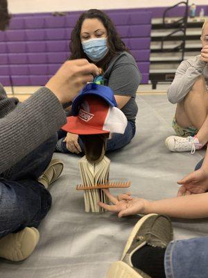 Students and educators engage in a strength-focused activity during youth-resiliency event, PHlight Club.