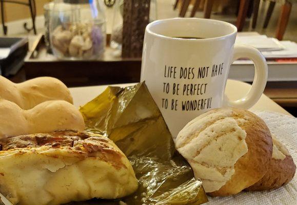 The perfect meal, tamales, hot cup of coffee and pan de manteca (sweet bread)