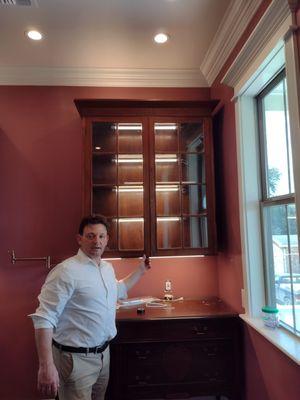 Kitchen cabinet lighting installation.