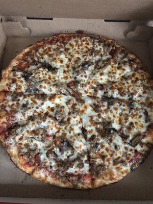 A Large pepperoni, mushroom & sausage... to go.