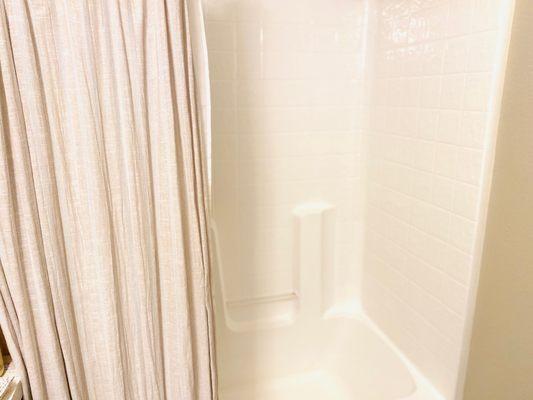 Tub shower enclosure