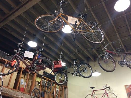 The ceiling has bikes hanging from it!