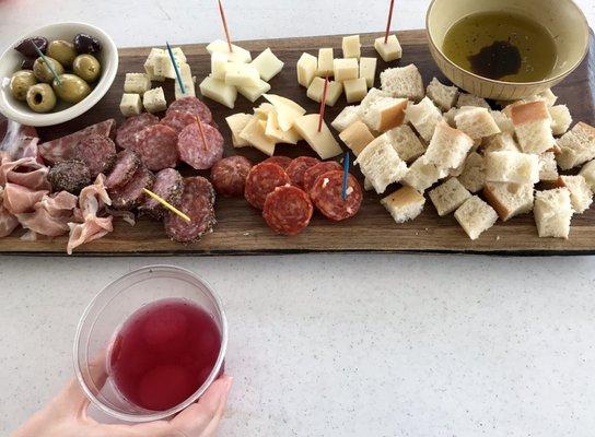 Medium charcuterie board and what's left of my wine slushee