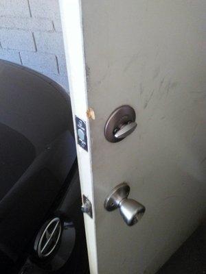 The door to the storage by my parking spot; damaged and dirty.