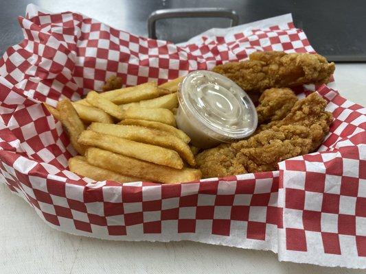 4 chicken strip basket with perfectly salted fries waiting for you to come and enjoy!!