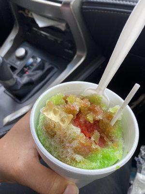 Each snow cone served with a gummy bear. Pictured frog in a blender.