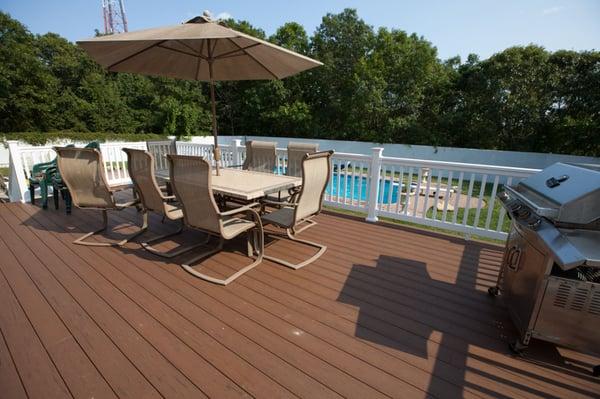 Back yard deck made with composite decking.