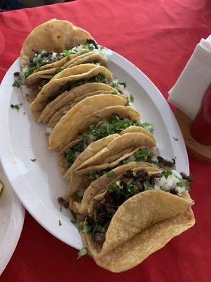 Steak Tacos, lots of onion and cilantro, they were okay!