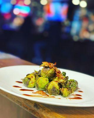 Roasted Brussels sprouts with crispy bacon , balsamic glaze