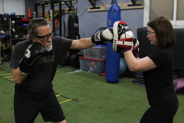 Our classes are designed for anyone with a desire to learn how to box. John is in his 80's and never boxed before.