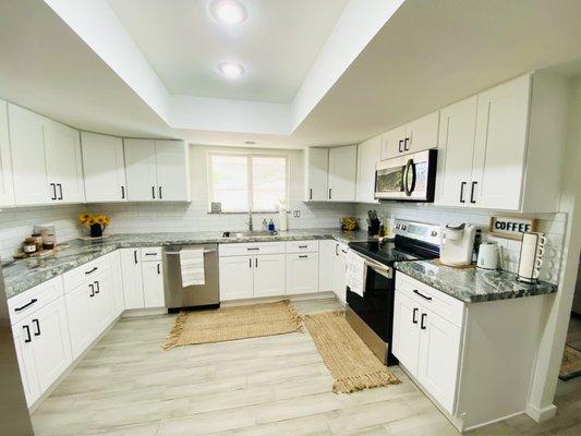 Our white shaker cabinets help brighten up our kitchen so much more!