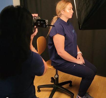 Nurse Injector Denise Kail and Surgical Tech Brooke Delph Weaver practicing taking patient photos.