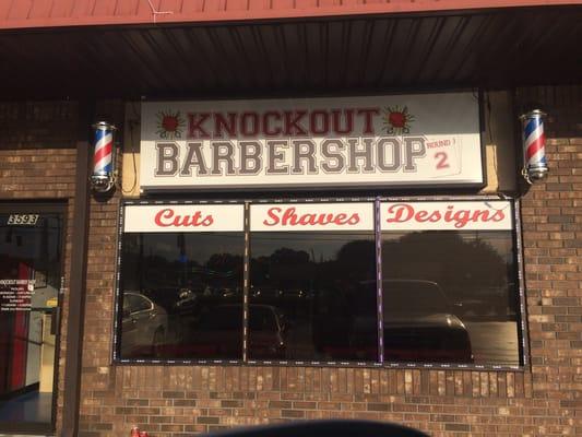 Storefront of the Knockout Barbershop