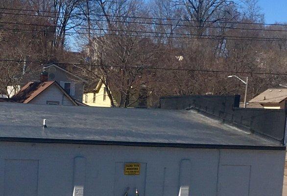 A fully adhered EPDM (rubber) roofing system. Customer more than satisfied. Crossfit Gym 16 Taylor St.