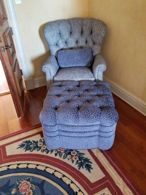 Tufted bedroom chair with contrasting ottoman